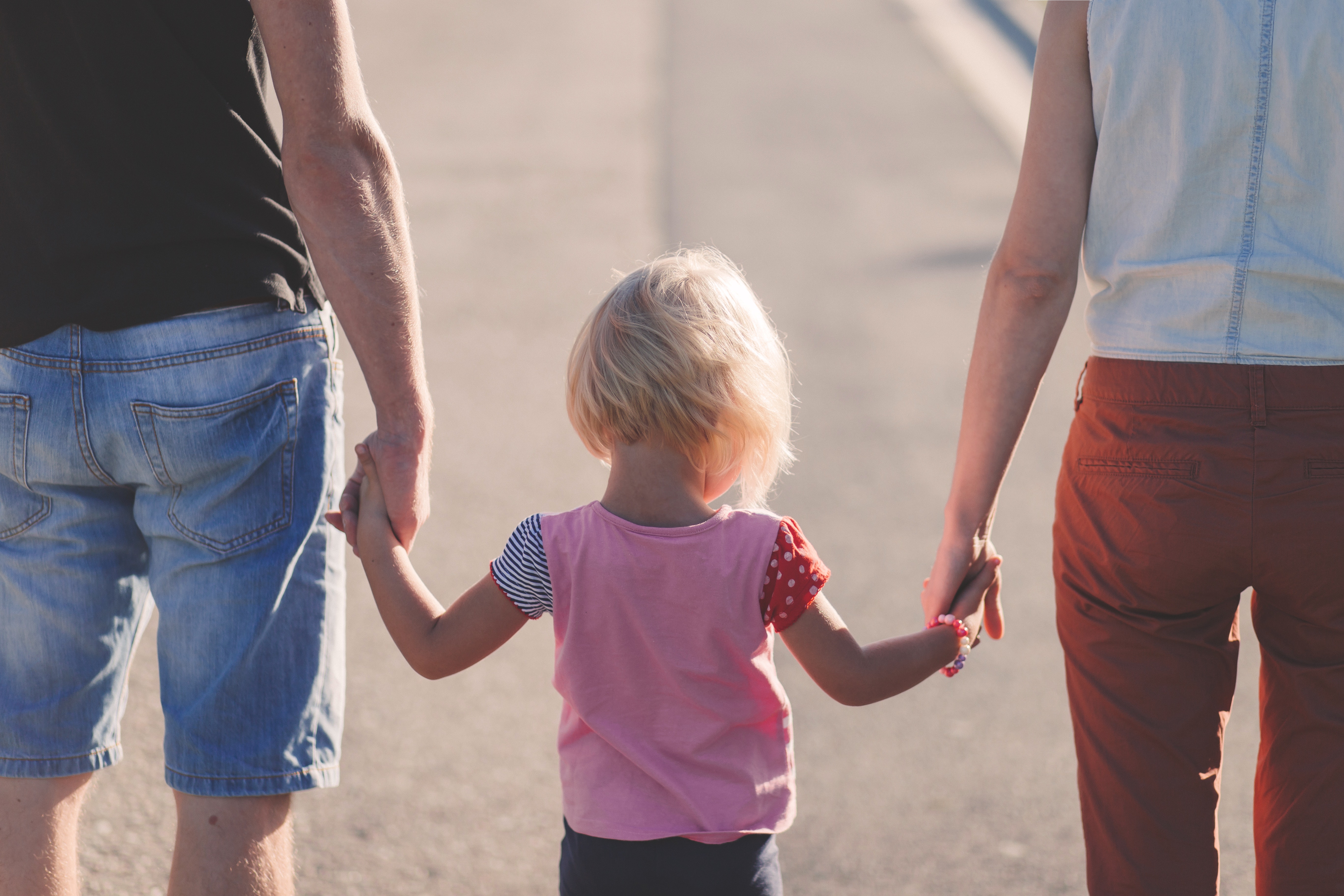 Child holding hands